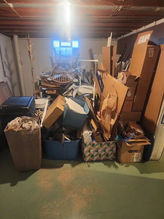 Roll-off dumpster container at job site for 2 Yard Dumpster Rental in Portage